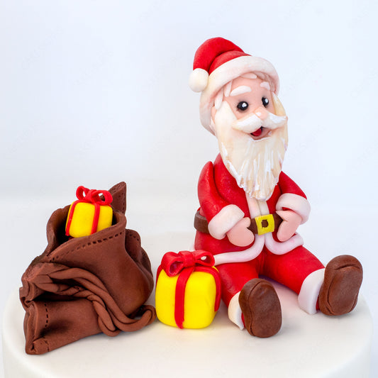 Edible Fondant Sitting Santa Clause with Gift Bag Cake Topper